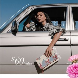 Rachel Pally reversible clutch